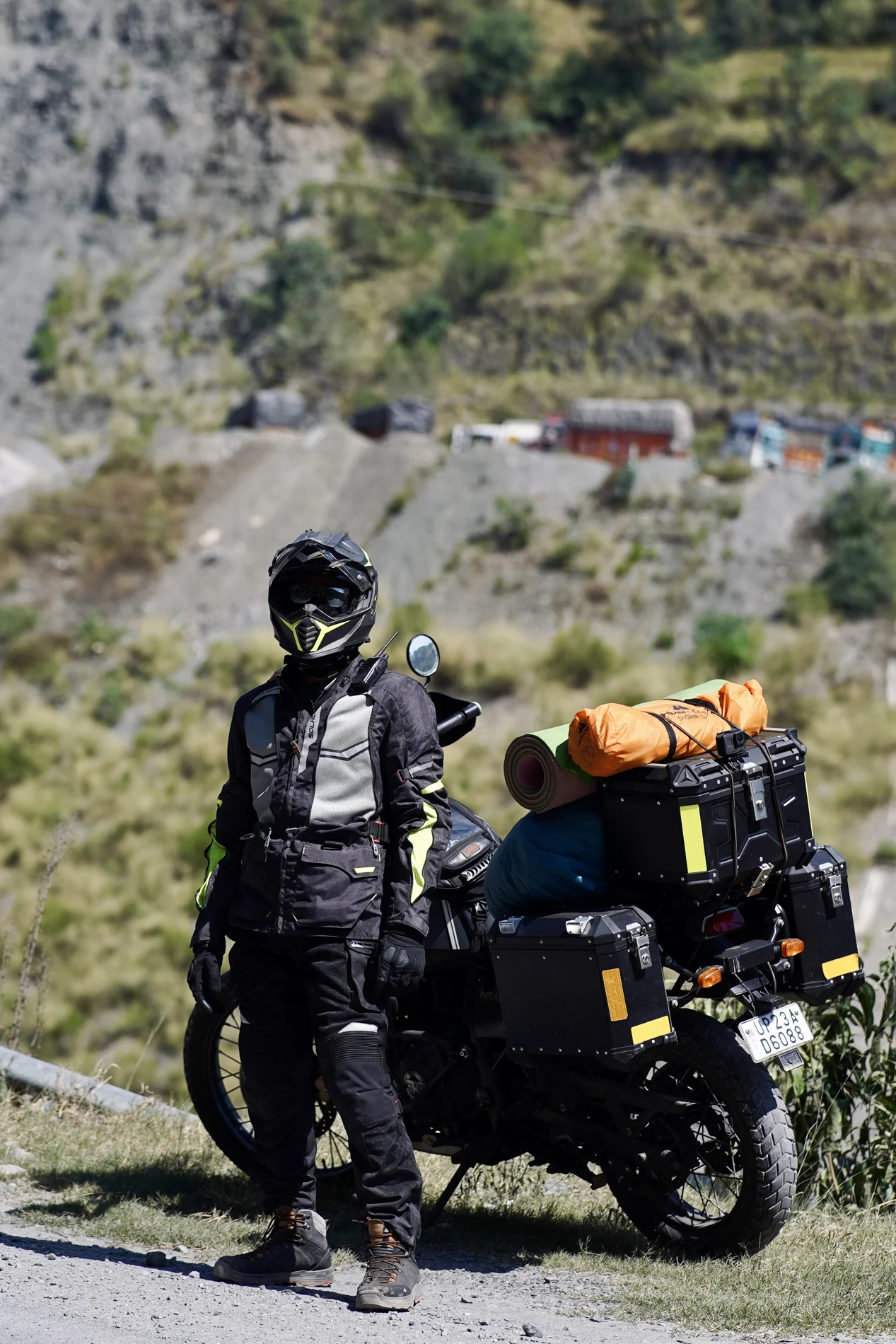 A motorcycle loaded with travel luggage
